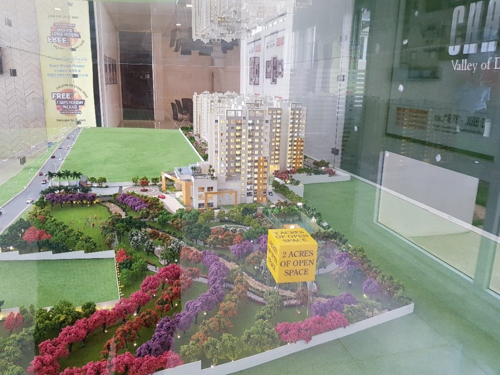 A scale model of the proposed Salapuria Sattva Misty Charm in their Marketing Office